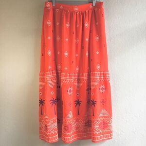 Sofia Vergara orange maxi skirt with pockets geometric pattern beach cruise boho